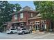 Brick building with parking and a restaurant and antique store at 200 Chaparral Trce, Tyrone, GA 30290