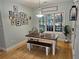 Cozy dining area with a wooden table, bench seating, and a large window with natural light at 200 Chaparral Trce, Tyrone, GA 30290