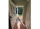 Inviting entryway featuring a tile floor, and a view of the porch, landscape and lake at 200 Chaparral Trce, Tyrone, GA 30290