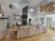 Bright and open living space with vaulted ceilings, a stone fireplace, and seamless flow to dining area at 200 Chaparral Trce, Tyrone, GA 30290