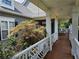 Spacious covered porch with architectural details, perfect for outdoor living and enjoying serene views at 200 Chaparral Trce, Tyrone, GA 30290