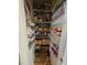 Walk-in pantry with shelves stocked with food items, providing ample storage space at 200 Chaparral Trce, Tyrone, GA 30290