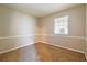 This bedroom features neutral walls, chair rail, and plush carpeting at 3163 Springside Xing, Decatur, GA 30034