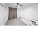 Neutral bedroom with carpet, ceiling fan, and closet at 503 Rising Dr, Woodstock, GA 30189