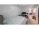 Bright bedroom offering a work desk, lots of light, and access to other rooms of the house at 503 Rising Dr, Woodstock, GA 30189