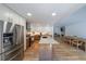 Modern kitchen featuring stainless steel appliances and a large island with a marble countertop at 503 Rising Dr, Woodstock, GA 30189