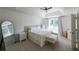 Bright main bedroom with tray ceiling, neutral carpet and bench seating at 503 Rising Dr, Woodstock, GA 30189
