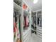 Organized walk-in closet with custom shelving and ample storage space at 503 Rising Dr, Woodstock, GA 30189