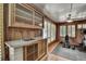 Cozy bar area featuring a sink, cabinet storage, and natural lighting at 1530 Niskey Lake Sw Trl, Atlanta, GA 30331