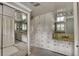 Bright bathroom showcasing ample storage cabinets, a vanity with neutral countertops, and a well-organized space at 1530 Niskey Lake Sw Trl, Atlanta, GA 30331