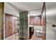 Compact bathroom with wood paneling and essential fixtures at 1530 Niskey Lake Sw Trl, Atlanta, GA 30331