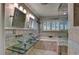 Elegant bathroom with glass vessel sinks, soaking tub, and a separate shower at 1530 Niskey Lake Sw Trl, Atlanta, GA 30331
