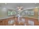 Bright bedroom with hardwood floors, recessed lighting, and windows with shutters offering lots of natural light at 1530 Niskey Lake Sw Trl, Atlanta, GA 30331