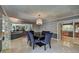 Elegant dining room featuring stylish chandelier, seating for six, and access to living spaces at 1530 Niskey Lake Sw Trl, Atlanta, GA 30331