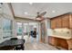 Bright breakfast nook with built-in desk and cabinets, a ceiling fan, and a window providing ample natural light at 1530 Niskey Lake Sw Trl, Atlanta, GA 30331
