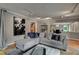Spacious living area boasts hardwood floors, gray walls, and comfortable sectional sofa at 1530 Niskey Lake Sw Trl, Atlanta, GA 30331