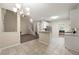 Open-concept kitchen with granite counters, stainless appliances, and easy access to the living area at 2004 Township Dr, Woodstock, GA 30189