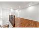 Spacious living room with wood floors, chandelier, and staircase at 3541 Ashcroft Se Dr, Smyrna, GA 30080