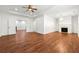 Open-concept living room with wood floors, fireplace and coffered ceilings at 3541 Ashcroft Se Dr, Smyrna, GA 30080