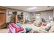 Basement featuring a sofa, armchair, entertainment center and other furniture at 4411 Westerling Ct, Powder Springs, GA 30127