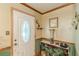 Welcoming entryway with decorative details and a charming table at 4411 Westerling Ct, Powder Springs, GA 30127