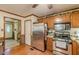 Well-equipped kitchen with stainless appliances and access to multiple rooms at 4411 Westerling Ct, Powder Springs, GA 30127
