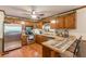 Spacious kitchen with stainless steel appliances and a breakfast bar at 4411 Westerling Ct, Powder Springs, GA 30127