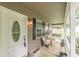 Inviting porch with seating area, ideal for relaxing and enjoying the outdoors at 4411 Westerling Ct, Powder Springs, GA 30127