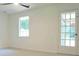 Bright bedroom with glass door and large window at 5974 Sw Four Winds Sw Dr, Lilburn, GA 30047