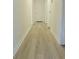 Hallway featuring wood-look flooring at 5974 Sw Four Winds Sw Dr, Lilburn, GA 30047