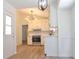 Bright kitchen with stainless steel appliances and modern lighting fixtures at 5974 Sw Four Winds Sw Dr, Lilburn, GA 30047