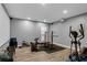 Basement exercise room featuring gym equipment and ample workout space at 935 Grove Valley Drive Dr, Cumming, GA 30041