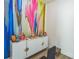 Office area featuring colorful decorative art on the wall and modern white shelving at 935 Grove Valley Drive Dr, Cumming, GA 30041