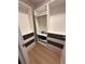 Walk-in closet complete with shelving, drawers, and ample storage space, offering optimal organization at 935 Grove Valley Drive Dr, Cumming, GA 30041