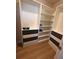 Walk-in closet complete with shelving, drawers, and ample storage space, offering optimal organization at 935 Grove Valley Drive Dr, Cumming, GA 30041