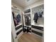Walk-in closet complete with shelving, drawers, and ample storage space, offering optimal organization at 935 Grove Valley Drive Dr, Cumming, GA 30041