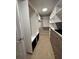 Spacious walk-in closet featuring custom shelving, drawers, and ample storage for clothes and accessories at 935 Grove Valley Drive Dr, Cumming, GA 30041