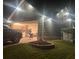 Exterior shows garage with lighting and landscaping at 499 Running Doe Ct, Suwanee, GA 30024