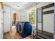 Well-appointed laundry room with ample storage, shelving, and a modern washer and dryer set at 824 Hickory Ridge Sw Rd, Lilburn, GA 30047