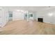 Bright living room boasts natural light, fireplace, and light-toned floors, creating an inviting and airy atmosphere at 22 Dunwoody Springs Dr, Atlanta, GA 30328