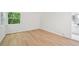 Bedroom featuring light wood floors, white walls, and natural light at 22 Dunwoody Springs Dr, Atlanta, GA 30328