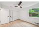 Bedroom with double closets, ceiling fan and good natural light at 22 Dunwoody Springs Dr, Atlanta, GA 30328