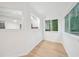 Bright dining area with view into kitchen at 22 Dunwoody Springs Dr, Atlanta, GA 30328