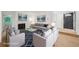 Staged living room featuring seating, a stylish rug, and a cozy fireplace at 22 Dunwoody Springs Dr, Atlanta, GA 30328