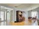 Dining room with wood floors and bright natural light near the front door at 2233 Hansford Pass, Buford, GA 30519