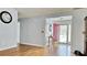 Inviting living room with wood floors and view of the front door at 2233 Hansford Pass, Buford, GA 30519