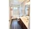 Bathroom featuring a shower/tub combo and a single sink vanity at 3948 Oak Glenn Dr, Duluth, GA 30096