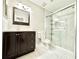 Bathroom featuring a sliding glass door shower, vanity and sink at 3948 Oak Glenn Dr, Duluth, GA 30096