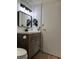 Stylish bathroom featuring modern lighting, vanity with storage, and contemporary finishes for added comfort at 2479 Peachtree Ne Rd # 317, Atlanta, GA 30305