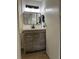 Contemporary bathroom featuring modern lighting, vanity with storage and stylish fixtures, enhancing comfort and style at 2479 Peachtree Ne Rd # 317, Atlanta, GA 30305
